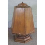 A modern beechwood church combined font or offering stand, 20th century, of tapered octagonal form