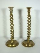 Two large double twist column brass candlesticks, 19th century, on dished bases, 35cm high; together