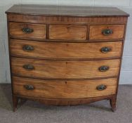 A George IV mahogany bowfront chest of drawers, circa 1820, with three short drawers over three long
