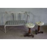 A pair of Victorian tapestry upholstered mahogany piano stools, adjustable; together with a small