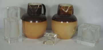 Two large Victorian Doulton stoneware harvest jugs; together with a set of four related clear