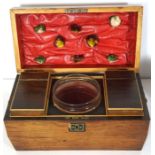A Victorian rosewood travelling dressing table box, circa 1840, with a fitted interior including a