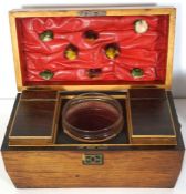 A Victorian rosewood travelling dressing table box, circa 1840, with a fitted interior including a