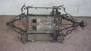 A very large Georgian style brass hall lantern, probably late 19th century, with four lights,