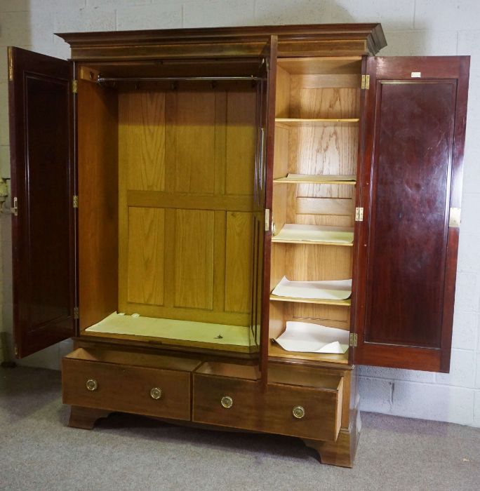 An Edwardian mahogany and satinwood banded triple wardrobe, with mirrored central door, over two - Image 2 of 5