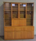 A modern light oak veneered and glazed display cabinet, 155cm wide, 186cm high