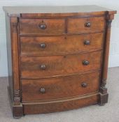 A Victorian mahogany bowfront chest of drawers, late 19th century, with two short and three long