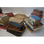 An assortment of books, scrap books, reference material and vinyl records, mainly classical