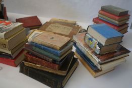 An assortment of books, scrap books, reference material and vinyl records, mainly classical