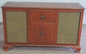 A mahogany veneered radiogram & record player, Garrard, circa 1970, 78cm high, 128cm wide