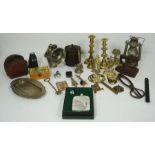 An assortment of miscellaneous objects, including a pair of 19th century brass candlesticks; a