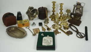 An assortment of miscellaneous objects, including a pair of 19th century brass candlesticks; a