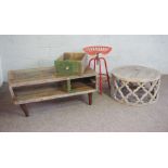 A pale hardwood coffee table, with quatrefoil trellis circular base, 77cm diameter; together with