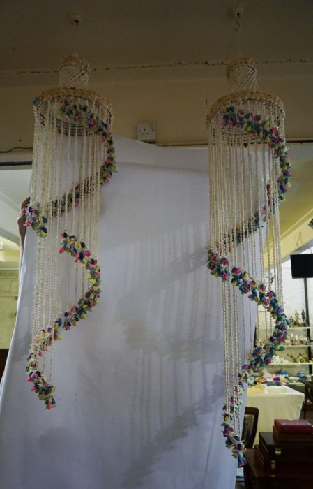 A pair of large decorative hanging shell mobiles, each with a spiral of coloured shells, 133cm & - Image 2 of 3