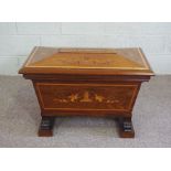 A late Regency mahogany and marquetry inlaid wine cistern, early 19th century, of sarcophagus