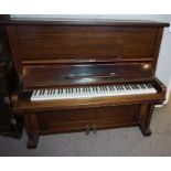 An Engel & Kruger mahogany cased upright piano, German early 20th century, in a plain panelled case,