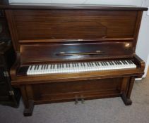 An Engel & Kruger mahogany cased upright piano, German early 20th century, in a plain panelled case,