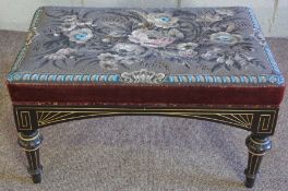 A mid Victorian beadwork footstool, late 19th century, with a padded rectangular top, the whole