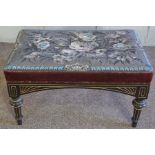 A mid Victorian beadwork footstool, late 19th century, with a padded rectangular top, the whole