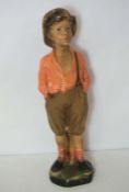 A German Goldsheider style pottery figure of Whistling Boy, inscribed OP 356, 60cm high