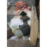 A large assortment of mixed fabric, cushions and curtains (a lot)