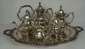 A five piece silver plated tea and coffee service, together with a large associated tray,