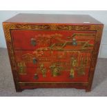 A small vintage Chinese style chest of three drawers, 20th century, with red and gilt lacquer