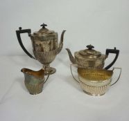 A Victorian silver four piece tea service, hallmarked London 1890, comprising a teapot, hot water