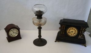 A Victorian mantel clock with scagliola pilasters, together with another mantel clock and an oil