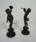 After Auguste Moreau, French (1834-1917), A pair of figures of putti, bronze with brown patina,