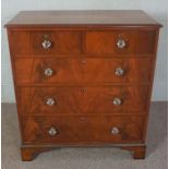 A Victorian mahogany chest of drawers, with two short and three long drawers, with modern glass