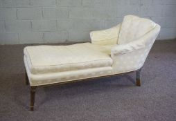 A small upholstered day bed, upholstered in light yellow damask, 150cm long