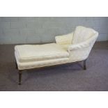 A small upholstered day bed, upholstered in light yellow damask, 150cm long