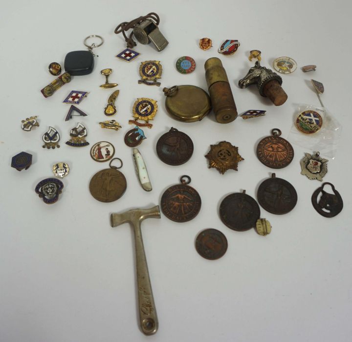 A quantity of assorted badges, a brass shell case lighter, Acme whistle and similar (a lot)