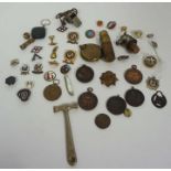 A quantity of assorted badges, a brass shell case lighter, Acme whistle and similar (a lot)