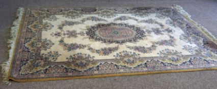 A large modern Aubusson style rug, with central foliate medallion and further swags on a yellow