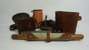 A leather cased pair of WWI binoculars, marked S3 / 12901 in a case dated 1916; together with two