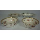 A pair of T Goode & Co/ Copeland gilt edged creamware bowls, decorated with sprays of flowers,