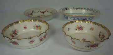 A pair of T Goode & Co/ Copeland gilt edged creamware bowls, decorated with sprays of flowers,