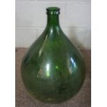A 19th century large green glass carboy, 35cm diameter; together with another similar and an