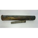 A very large brass shell case, possibly German, WWII. The case marked ‘Nur Für Sp 6’ with a