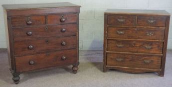 A Victorian provincial chest of drawers, with two short and three long drawers and reeded canted