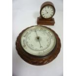 A small walnut cased drumhead mantel clock, dead beat escapement by Vapp Brevett, 16cm high;