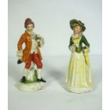 A Staffordshire flatback figure of a Lady and Gallant, she holding a Fallow Deer, 31cm high;