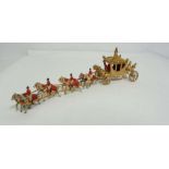 A Vintage John Hill & Co. (Metal Toys) Ltd model of the 1937 Coronation Royal Coach and horses, with