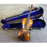 A vintage unnamed violin, with two bows, one stamped ‘Erich Steiner’, the other stamped ‘Japan’, the