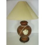 A pair of Renaissance style pricket table lamps, modern; together with a large pottery classical