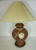 A pair of Renaissance style pricket table lamps, modern; together with a large pottery classical