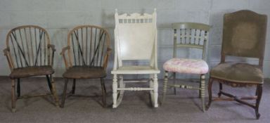 A white painted rocking chair; together with two small Windsor armchairs, with elm seats, a French