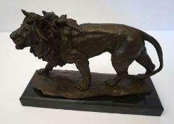 Style of Antoine-Louis Barye, 20th century edition, A Walking Lion,  cast with bronzed patina, on